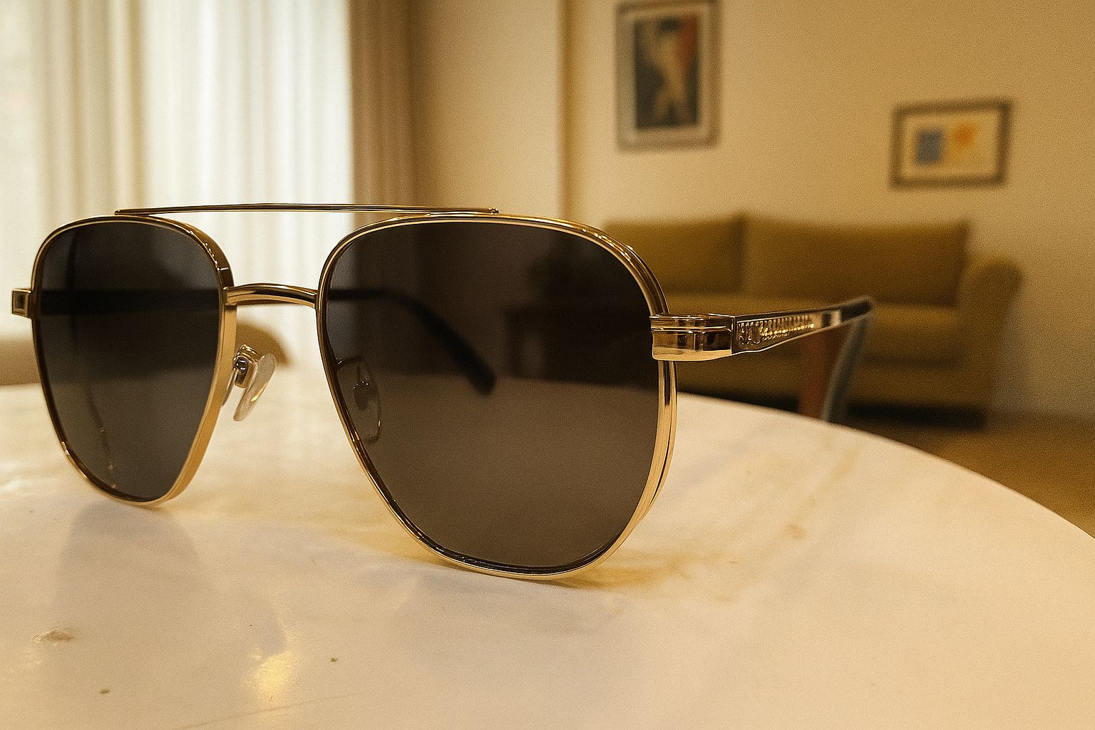  Meeran polo sunglasses with black lenses and a black/gold frame, featuring UV protection